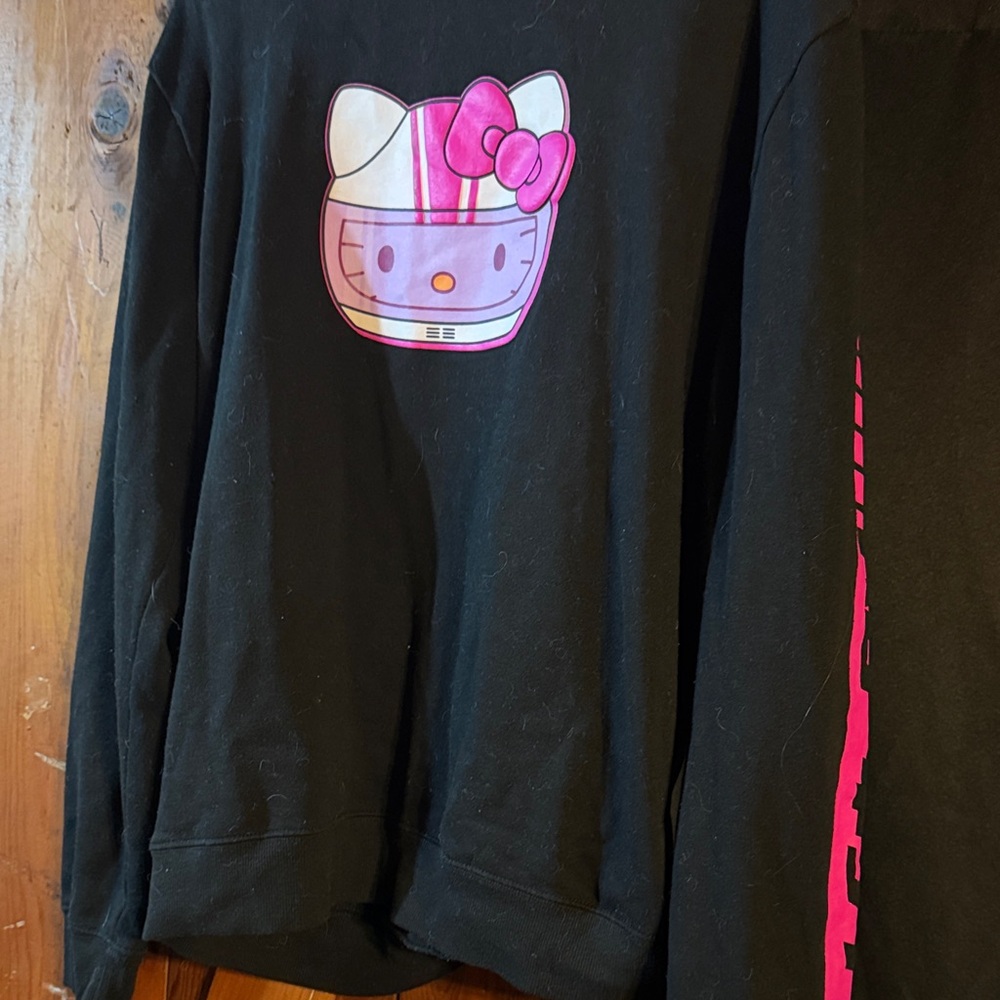 Hello Kitty Black Long Sleeve Tee with Pink Helmet Design